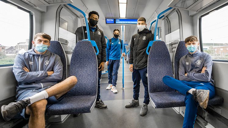Face-covering footballers: (front l to r) Luton Town first-team squad members Corey Panter and Sam Beckwith; (rear l to r) current apprentices Coree Wilson, Adam Wedd and Josh Swan