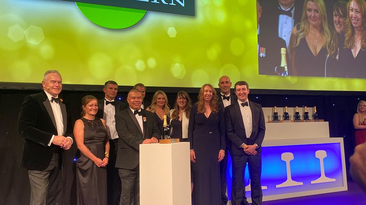 Southern Managing Director Angie Doll (third from right) and her team accept the award 'Passenger Operator of the Year' from Professor Jonathan Van-Tam, Deputy Chief Medical Officer (centre), at the National Rail Awards