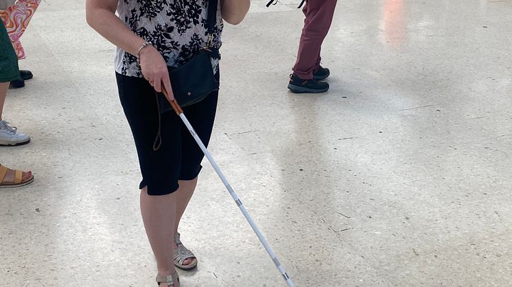 Linn Davies is guided through Brighton station using the Aira app 2