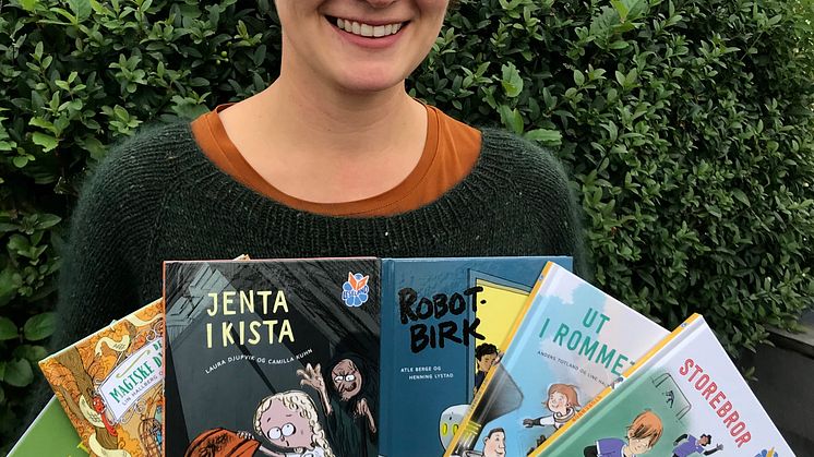 Redaktør Elen Betanzo med dei 6 nye Leseland-bøkene