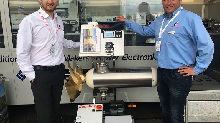 Hi-res image - Fischer Panda UK - Chris Fower, Sales and Marketing Director, Fischer Panda UK, and Martin Mews, Diesel-Electric Propulsion Systems Specialist at Fischer Panda GmbH, with the new 100 kW electric motor at Seawork International