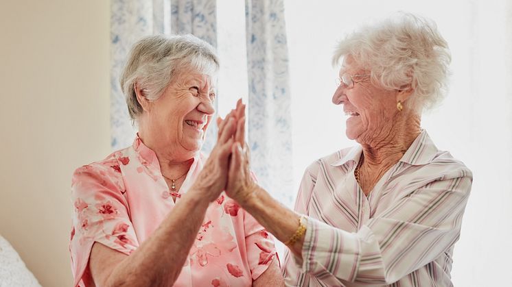 57101822-good-friends-make-for-a-good-mood-two-happy-elderly