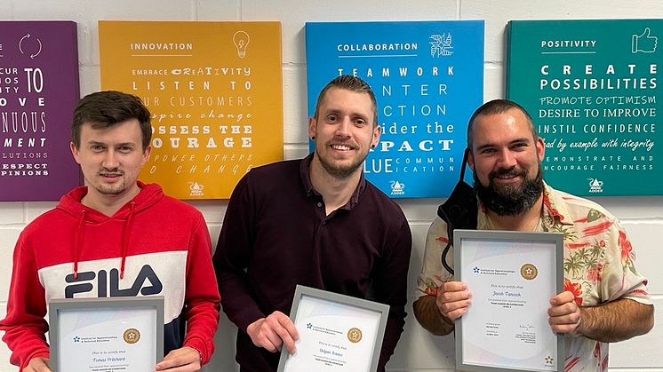 Adder apprentices, Tom, Delyan and Jacob, celebrate their level three apprenticeship success