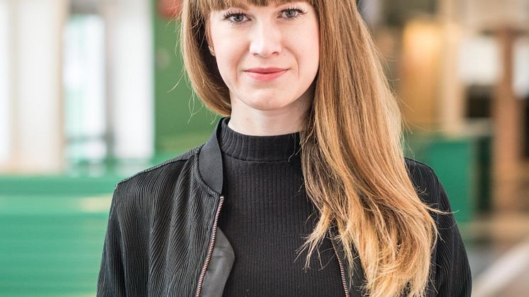 Emma Pihl Skoog har skrivit avhandlingen ”Kraftkarlar och knockouts: Kraftsporter, kropp och klass i Sverige 1920–1960”. Foto: Stockholms universitet