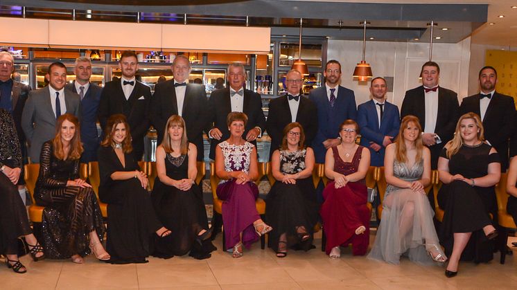 Hi-res image - Fischer Panda UK - The Fischer Panda UK team celebrate at a black-tie dinner to mark their 25th anniversary year