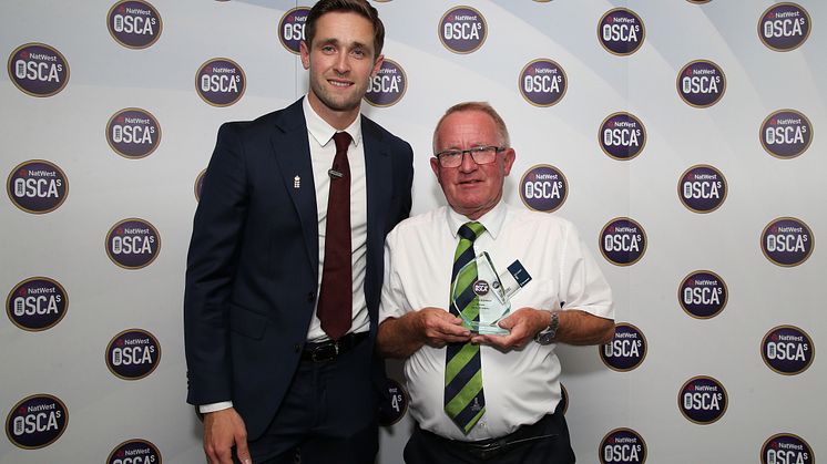 Chris Woakes presents the NatWest Lifetime Achiever OSCA to Ernie Brabbins of Appleby Eden Cricket Club at Lord's