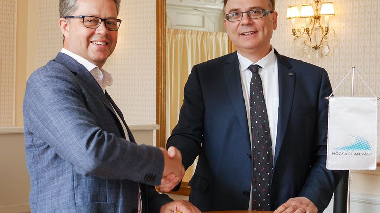 Två nöjda Martin efter påskrift - Carling och Hellström.