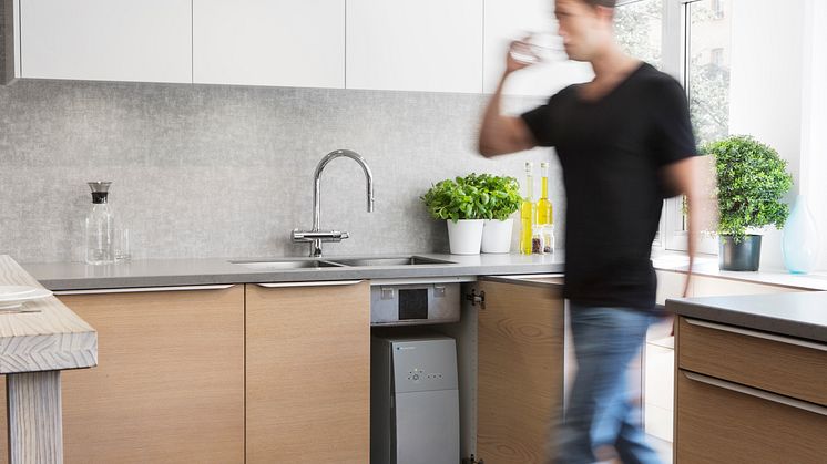 The highly compact Bluewater Pro fits neatly under the kitchen sink to deliver 1825 gallons of direct-flow water a day .