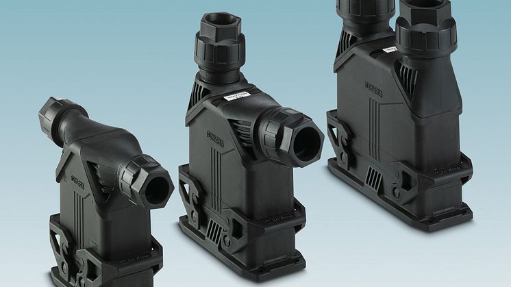 Connector housing with lateral and straight cable outlet direction