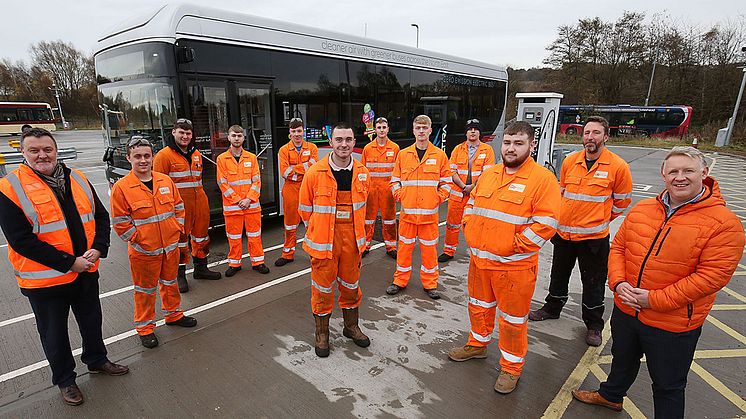 (L-R) Kevin Marston, Assistant Principal at Gateshead College, with some of the apprentices, and Colin Barnes, engineering director at Go North East