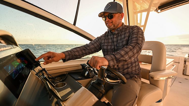 High res image - Raymarine - Axiom+ Captain at the helm