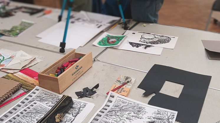 Art work laid out on a table