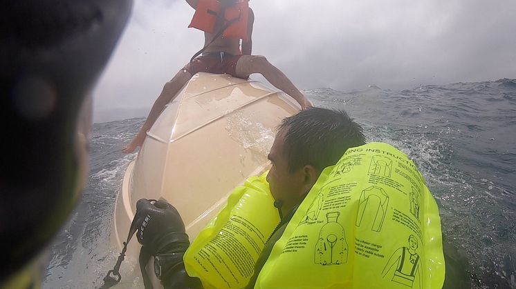 Hi-res image - ACR Electronics - GoPro footage of the fishermen awaiting rescue