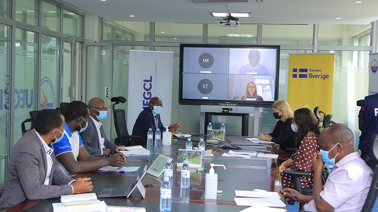 Signing ceremony in Kampala, Uganda. Swedfund participates online.