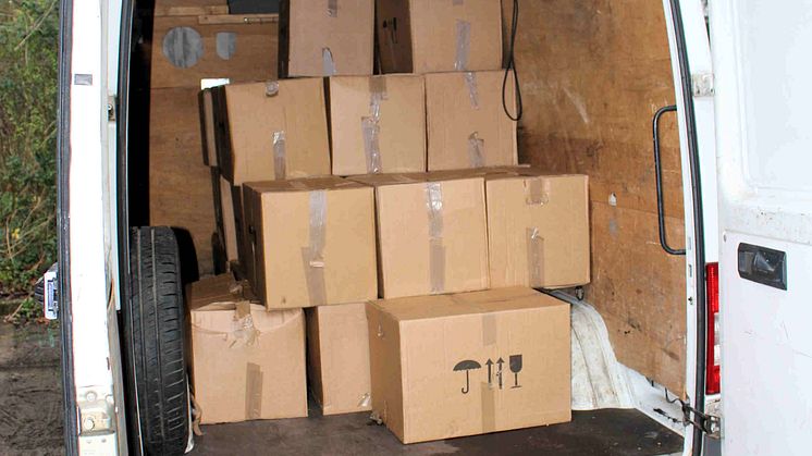 SE 06.17 Boxes containing  cigarettes in back of van