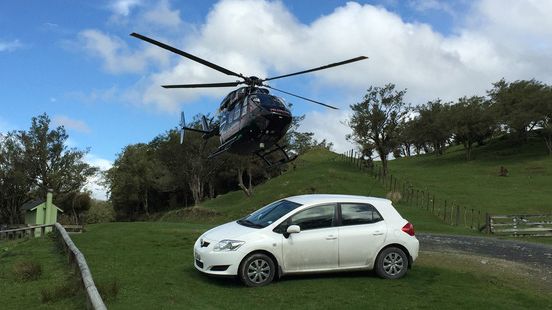 Image - Ocean Signal - The Lowe Corporation Rescue Helicopter returns  Clive and Marie Cresswell to their car 