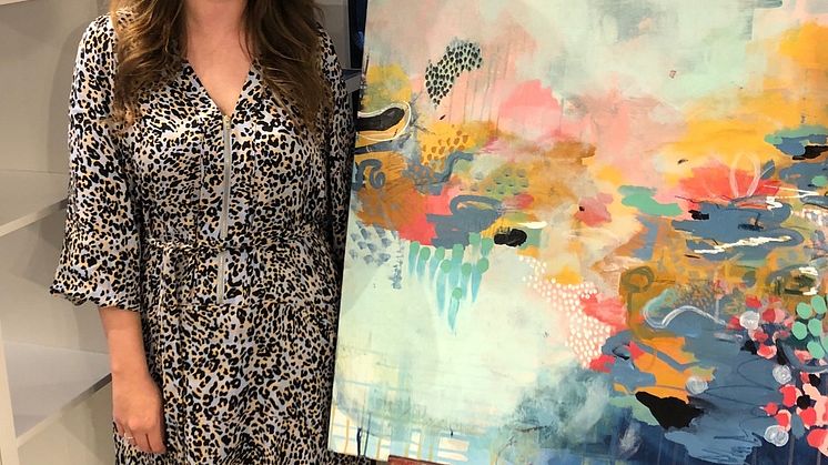 Northumbria alumna Jessica Slack with her artwork 'Finding Life's Joy'