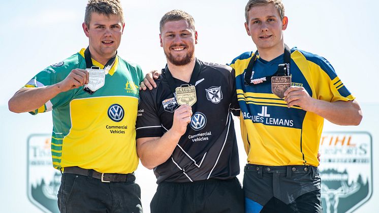 Josh Bakes, Australien, Chris Lord, Nya Zeeland, och Emil Hansson från Sverige stod överst på pallen i Rookie-VM. Foto: STIHL TIMBERSPORTS®.