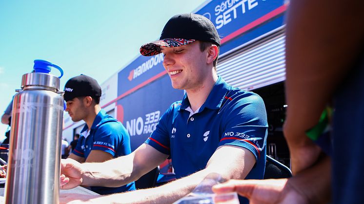NIO333 race team drivers stay hydrated while signing autographs at the Cape Town BB FIA Formula E World Championship 