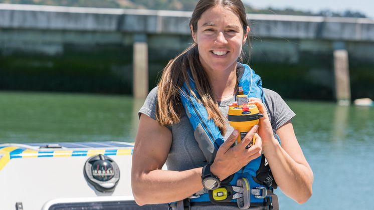 Ocean Signal-sponsored North Pacific solo rower Lia Ditton with her SafeSea E100G EPIRB