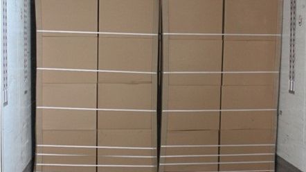 Pallets of cigarettes in Sokorai's trailer, with some boxes of grapes on top