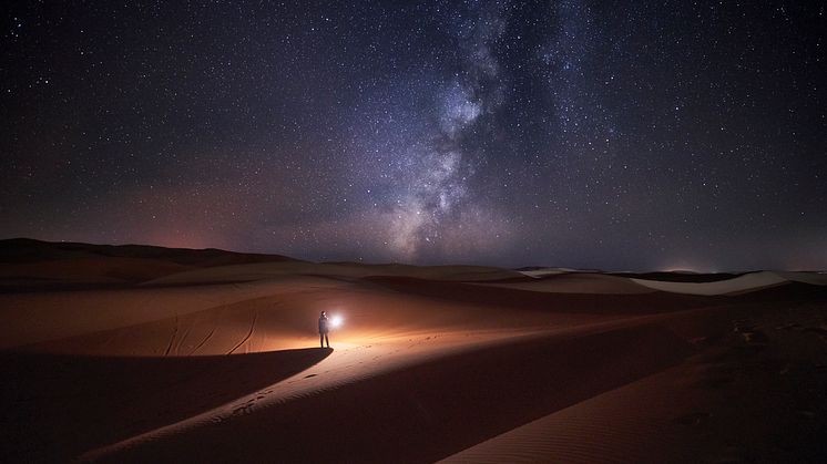 DEST_MOROCCO_MERZOUGA_DESERT_PERSON_NIGHT_SKY_GettyImages-1147346778_Universal_Within usage period_79461-1.jpg