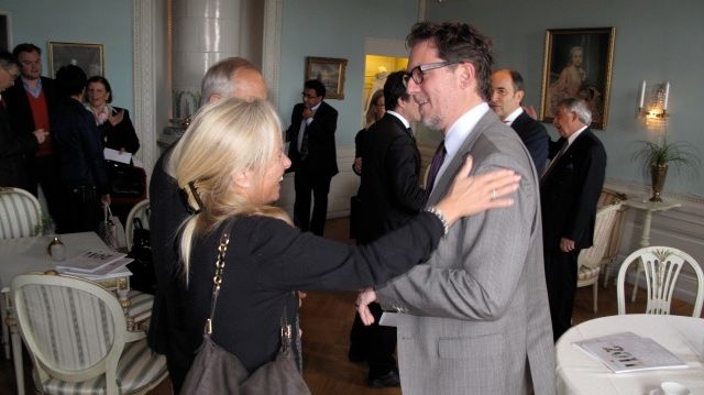 Pia Hellman greets Open's David Gray during Cavotec's AGM in Stockholm