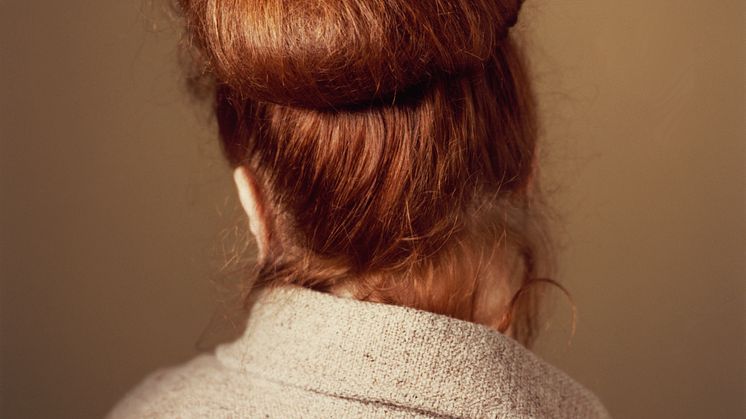 Woman Wearing Her Hair in a Knot, 1997 © Marjaana Kella
