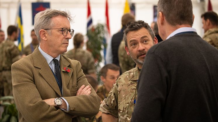 Systematic UK's Vice President James Hamilton (left) discusses the JEF exercise on the Distinguished Visitors Day (Credit: Crown Copyright)