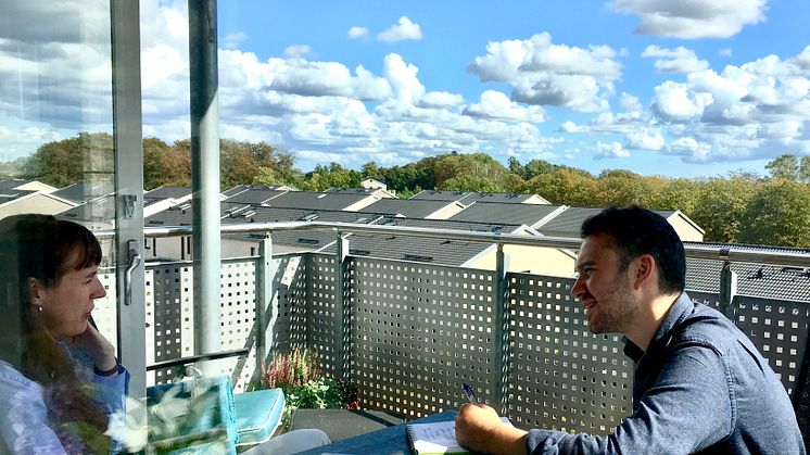 Ellen McKnight and Luke Mintz on Ellen's balcony.