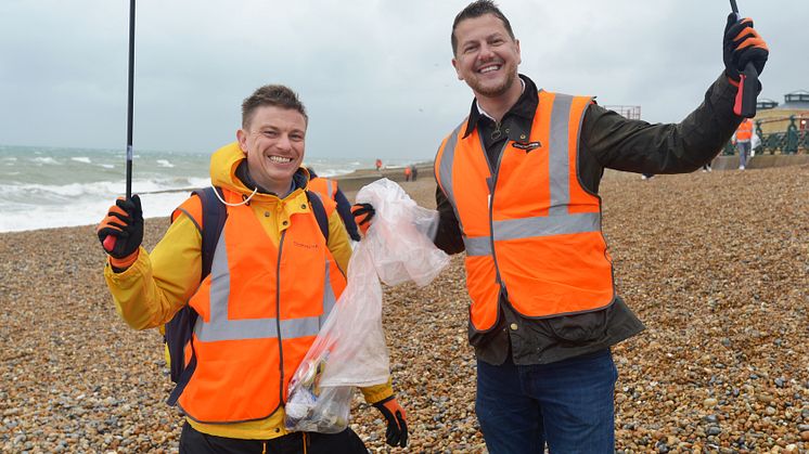 Soaked but still smiling - Project Consultation Manager Ben Thomas and Events Manager David Mitchell at the Brighton & Hove GTR beach clean 2023