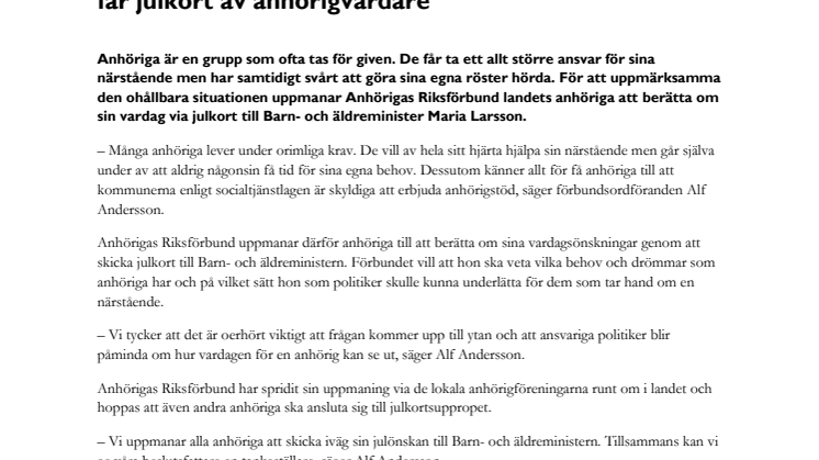 Barn- och äldreminister Maria Larsson får julkort av anhörigvårdare