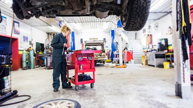 Female mechanic in garage