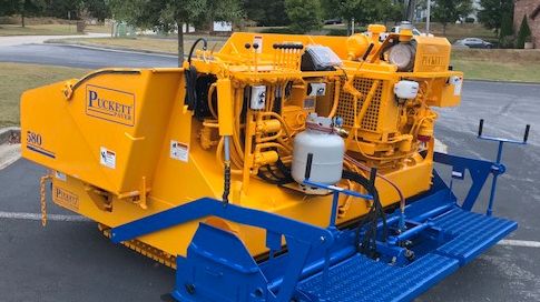 The Puckett 580 asphalt paver with customized 3TNV88C-DYEM YANMAR Tier 4F engine from YANMAR Mastry Engine Center