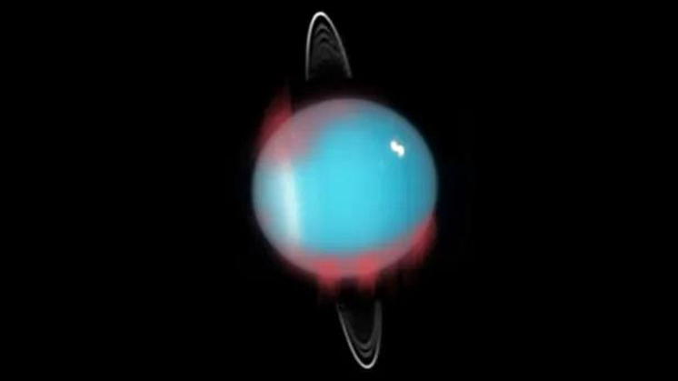 An artistic representation of how the northern infrared aurora would have looked like in 2006 (marked in red). The darker red locations indicate confirmed aurora locations, with fainter red used to mark possible aurora locations.