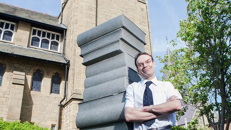 Fab four for record-breaking graduate