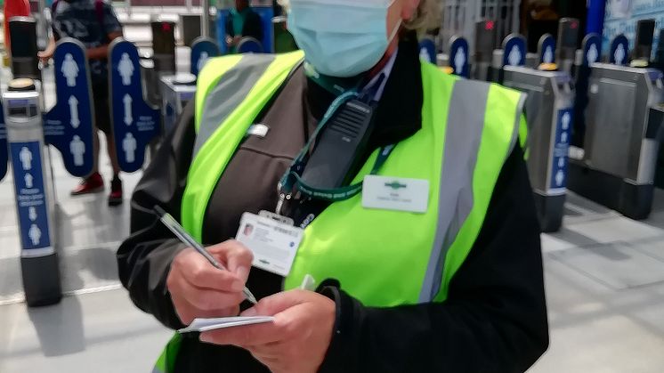 Social distancing at East Croydon station - staff member