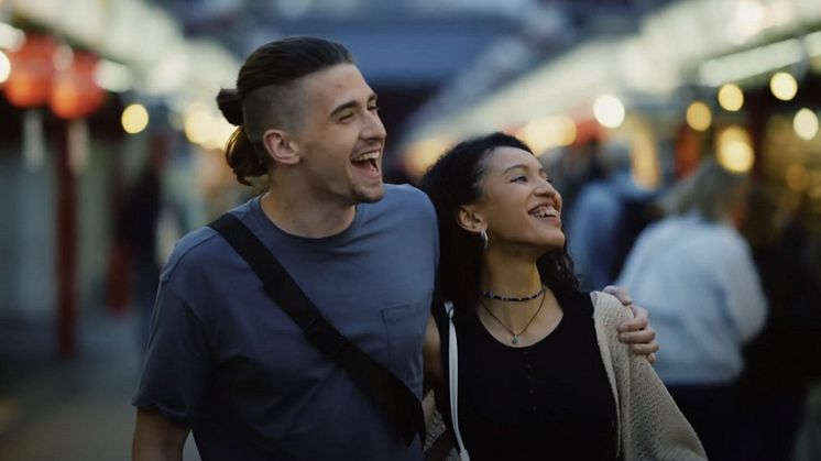 Young Couple Browsing Through Asakusa's Nakamese