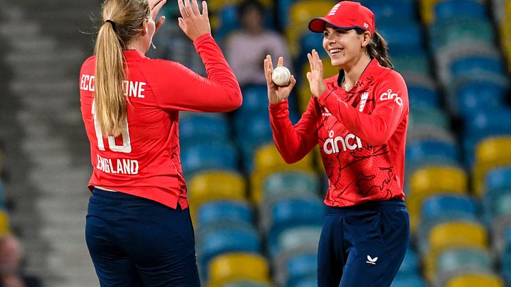 Sophie Ecclestone and Maia Bouchier celebrating at the Kensington Oval, Barbados. 