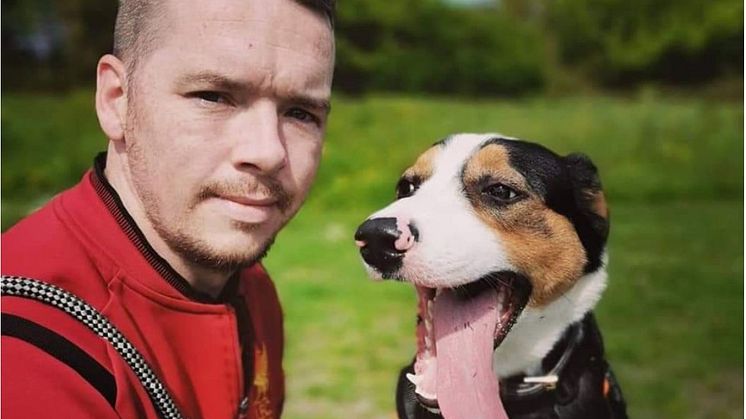 Mark Docksey with the family’s dog, Bohdi