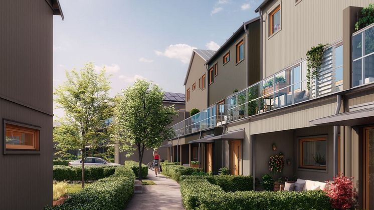 Brf Elins Trädgårdar - 3D-bild av flerbostadshus från innergård. 