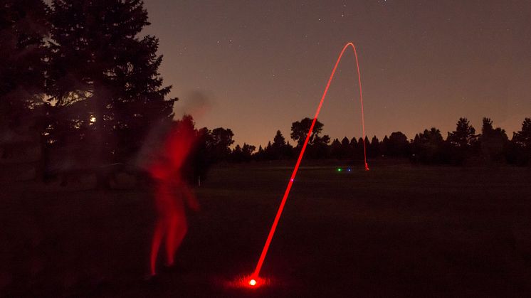 Lysande golfboll röd