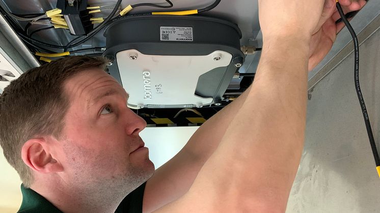 GTR Wireless Systems Engineer Robin Hayman inspects Wi-Fi fitted to the final Southern units