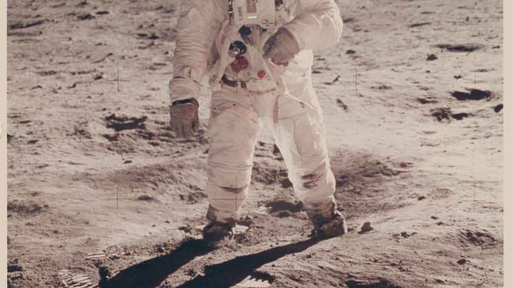 Buzz Aldrin’s gold-plated sun visor reflects the photographer and the LM Eagle.jpg