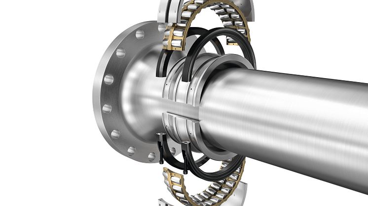 Split asymmetric spherical roller bearing, rotor bearing for wind turbines