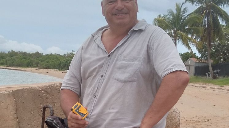 Solo yachtsman Nigel Fox with the Ocean Signal rescueME PLB1 that saved his life