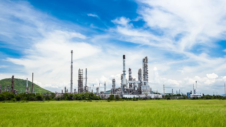 Refinery in the green with blue sky - Tungphoto_Shutterstock_125837234