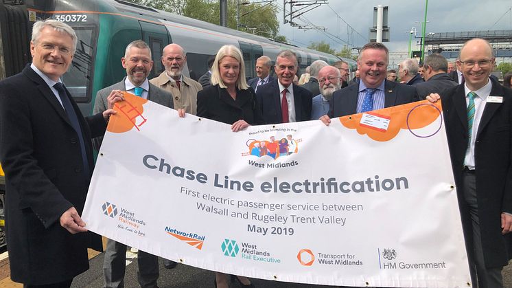 Rail Minister Andrew Jones (far left) and local partners and stakeholders at Rugeley Trent Valley station, following the inaugural electric passenger service from Walsall on 10 May 2019