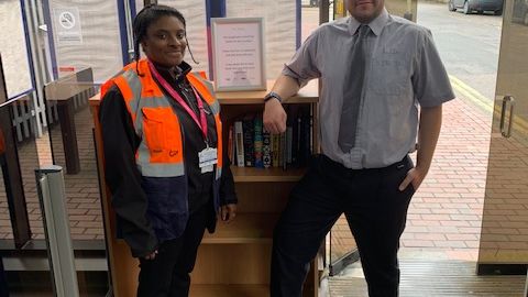 Thameslink staff Phyllicia Salmon and Stuart Miller at Radlett railway station with the new bookcase