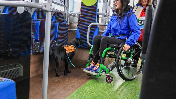 Local bus user Grace with assistance dog Star